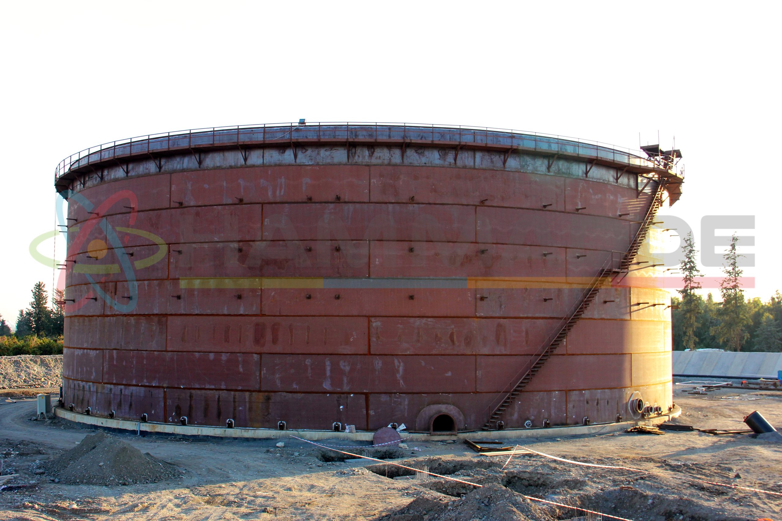View of the new installation crude oil storage tank with floating roof in the construction site. It has got seven shell course.